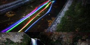 Glow sticks in a waterfall.
